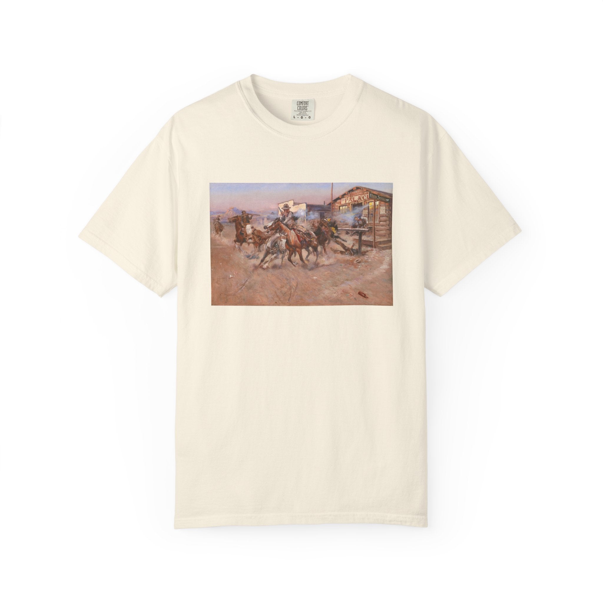 Beige T‑shirt featuring Charles Marion Russell’s Smoke of a .45, showing a cowboy firing his revolver in a tense Western scene.
