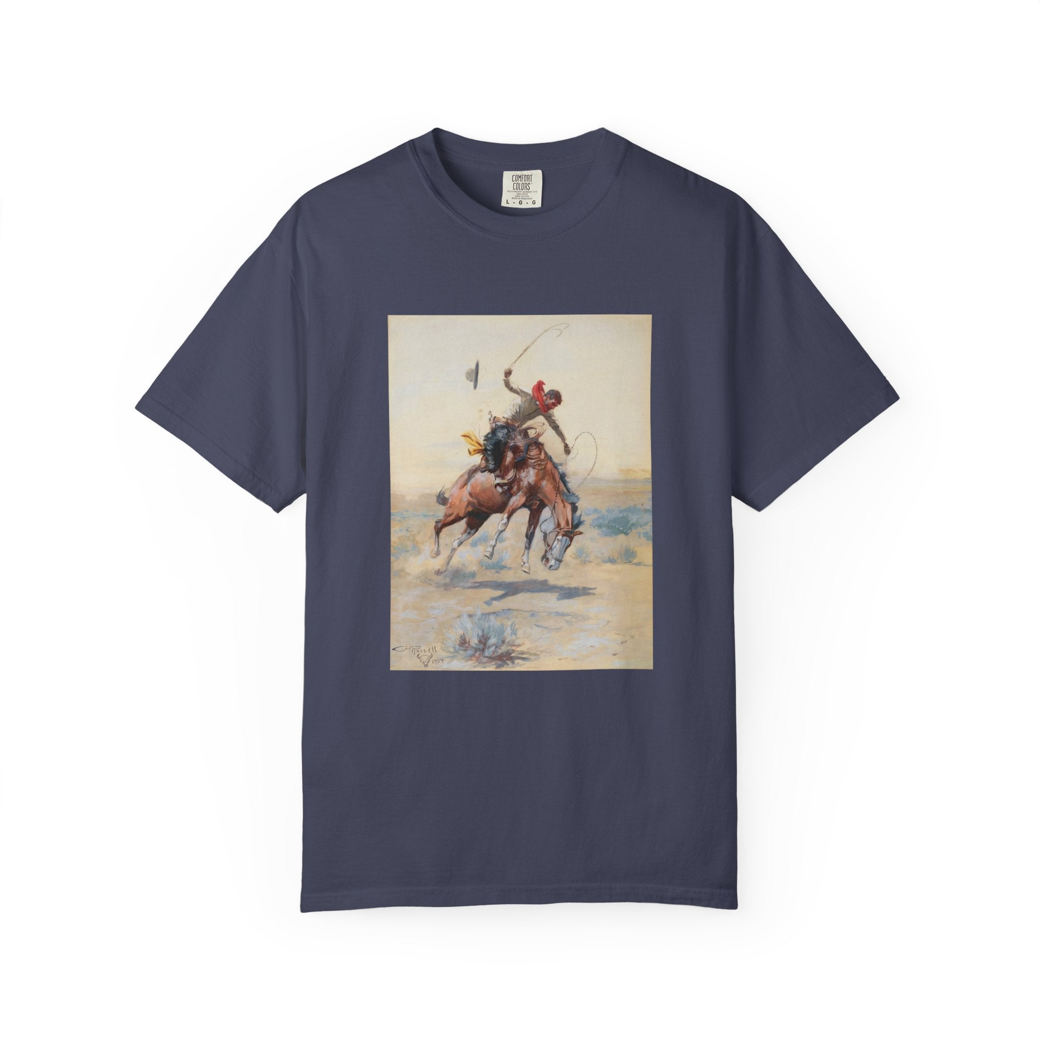 Navy blue T-shirt featuring Charles Marion Russell’s The Bucker, showing a cowboy riding a bucking horse in a Western landscape.