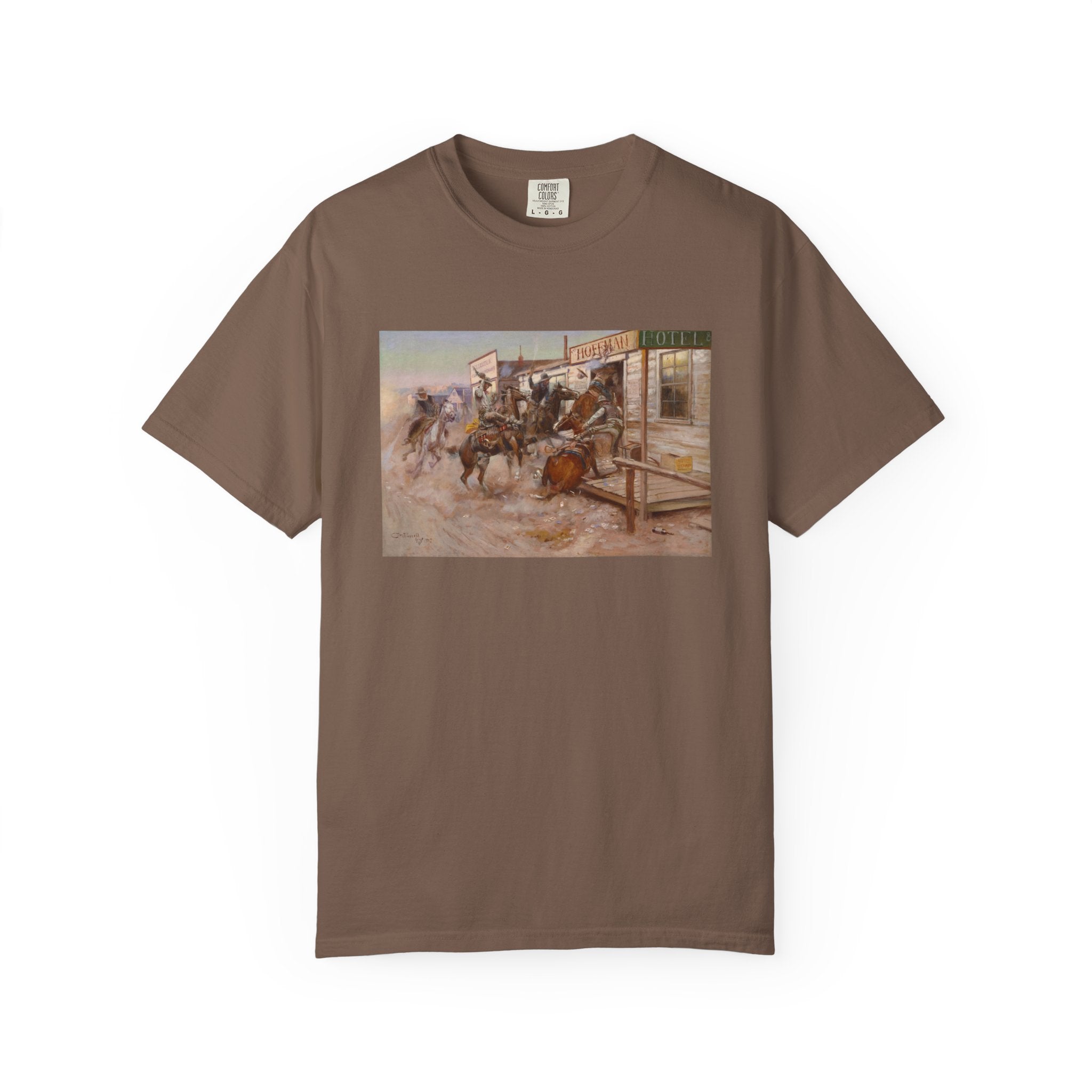 Brown T‑shirt featuring Charles Marion Russell’s In Without Knocking, showing cowboys riding horses into a frontier town, causing commotion outside a saloon.