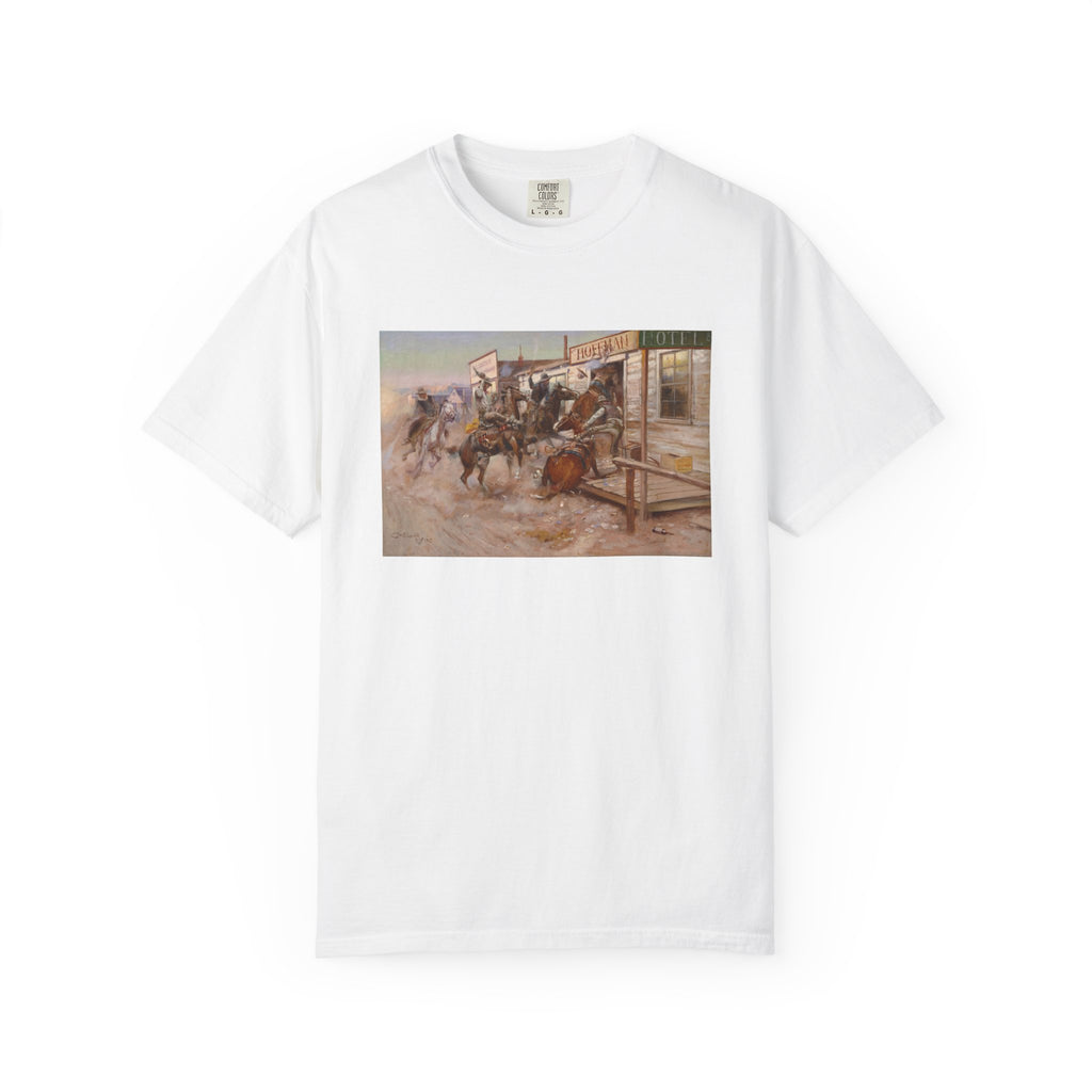 White T‑shirt featuring Charles Marion Russell’s In Without Knocking, showing cowboys riding horses into a frontier town, causing commotion outside a saloon.