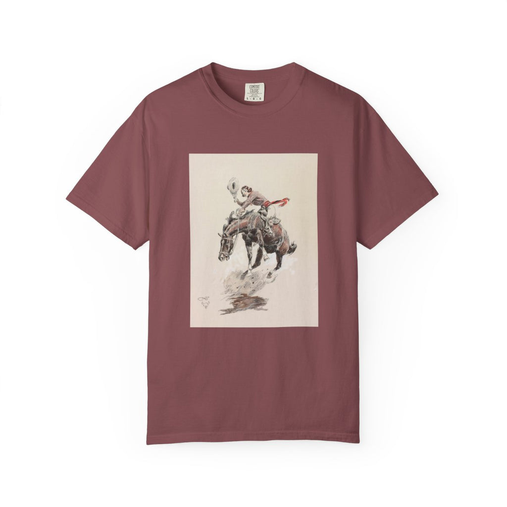 Maroon T-shirt featuring Charles Marion Russell’s Bucking Horse and Cowgirl, showing a cowgirl riding a bucking horse in a Western scene.