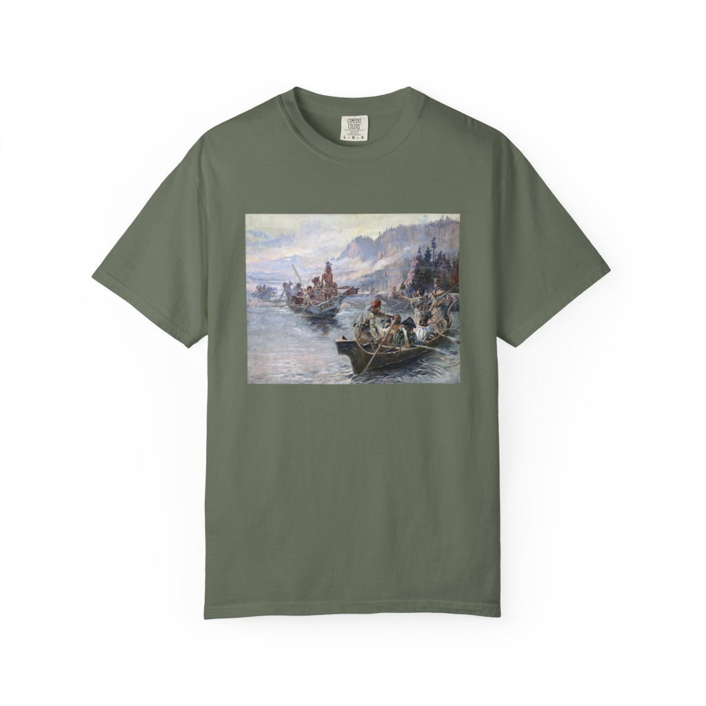 Green T‑shirt featuring Charles Marion Russell’s Lewis and Clark Expedition scene, showing members of the expedition in canoes meeting Native Americans along a river.